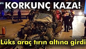 Uşak'ta lüks araç tırın altına girdi; 1 ölü
