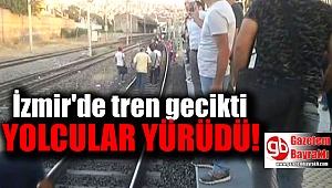 İzmir'de tren gecikince raylara inen yolcular diğer durağa yürüdü