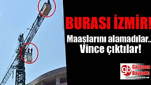İzmir'de işçiler maaşlarını alamayınca vince çıktı
