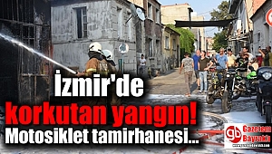 İzmir'de, motosiklet tamirhanesi yandı