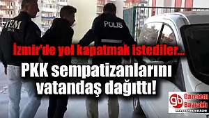 İzmir'de yol kapatan PKK sempatizanlarını vatandaş dağıttı.
