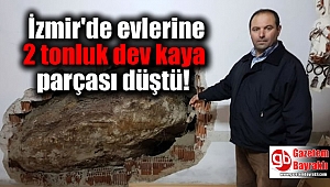 İzmir'de evlerine 2 tonluk dev kaya parçası düştü