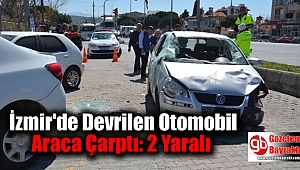 İzmir'de Devrilen Otomobil Park Halindeki Araca Çarptı: 2 Yaralı