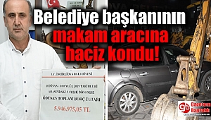 Belediye başkanının makam aracına haciz kondu