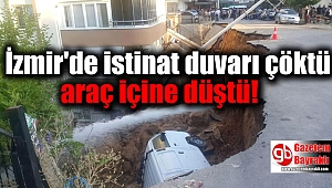 İzmir'de istinat duvarı çöktü araç içine düştü