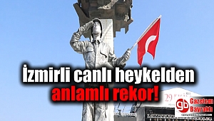 İzmirli canlı heykelden anlamlı rekor