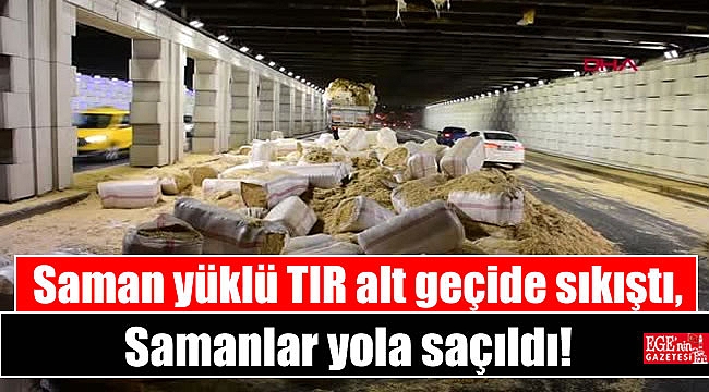 Saman yüklü TIR alt geçide sıkıştı, samanlar yola saçıldı