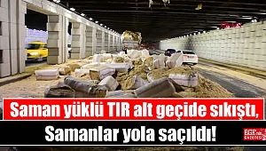 Saman yüklü TIR alt geçide sıkıştı, samanlar yola saçıldı