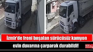 İzmir'de freni boşalan sürücüsüz kamyon evin duvarına çarparak durabildi