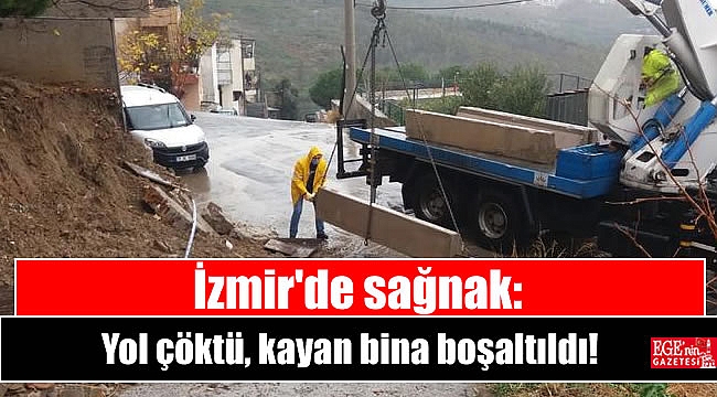 İzmir'de sağnak: Yol çöktü, kayan bina boşaltıldı