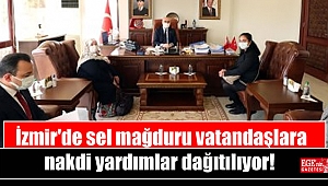 İzmir'de sel mağduru vatandaşlara nakdi yardımlar dağıtılıyor