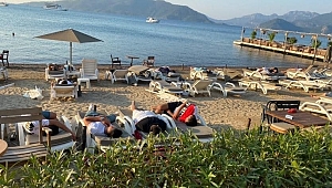Muğla'da yer bulamayanlar sahillerde uyudu!