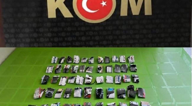 Gazete kağıtlarına sardığı uyuşturucularla yakalandı