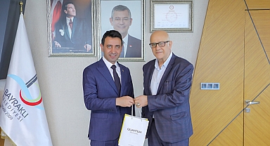 Bayraklı Çarşı Esnafları Derneği Başkanı Ertuğrul Civelek'ten İrfan Önal'a ziyaret